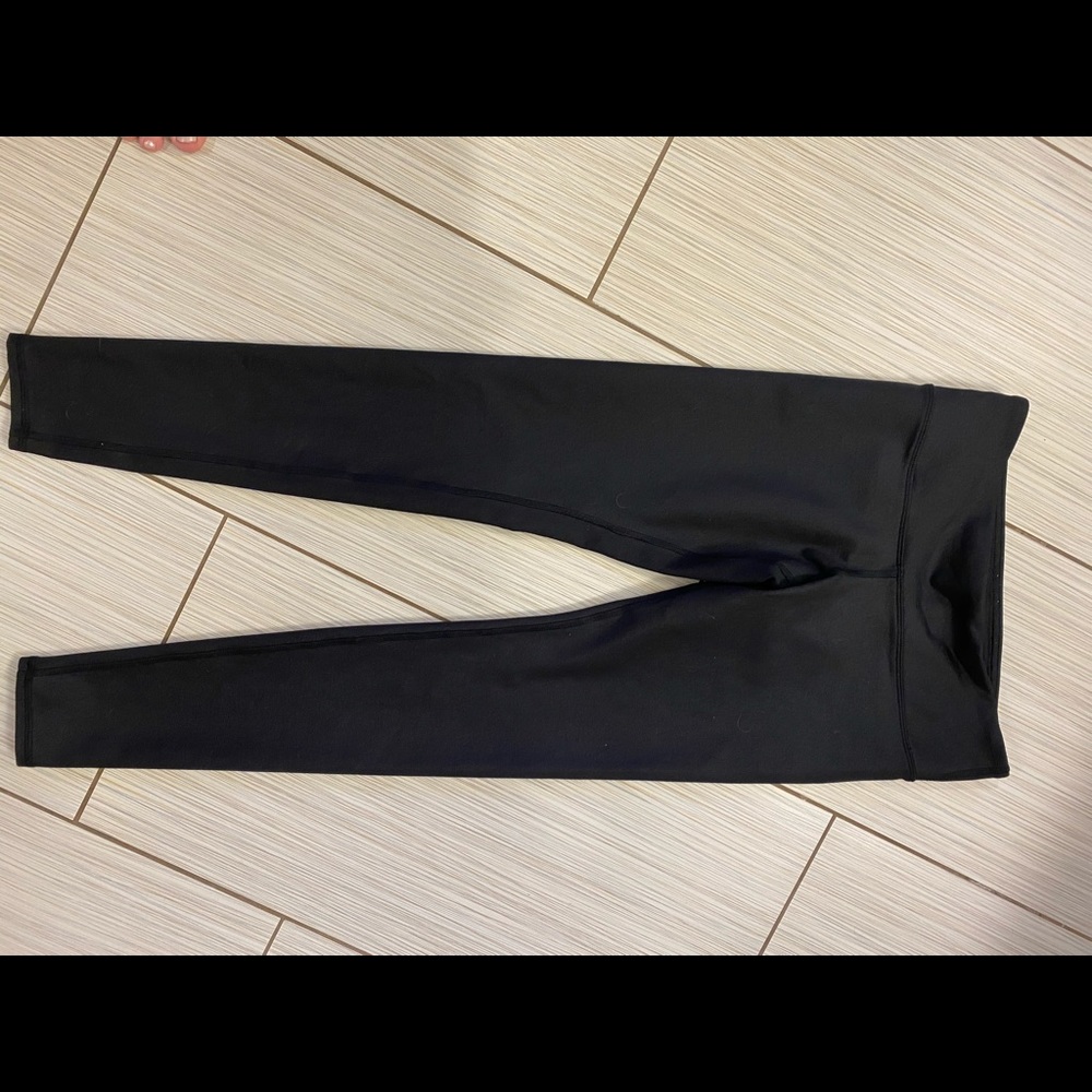 Alo leggings NWOT size medium. Black shimmer